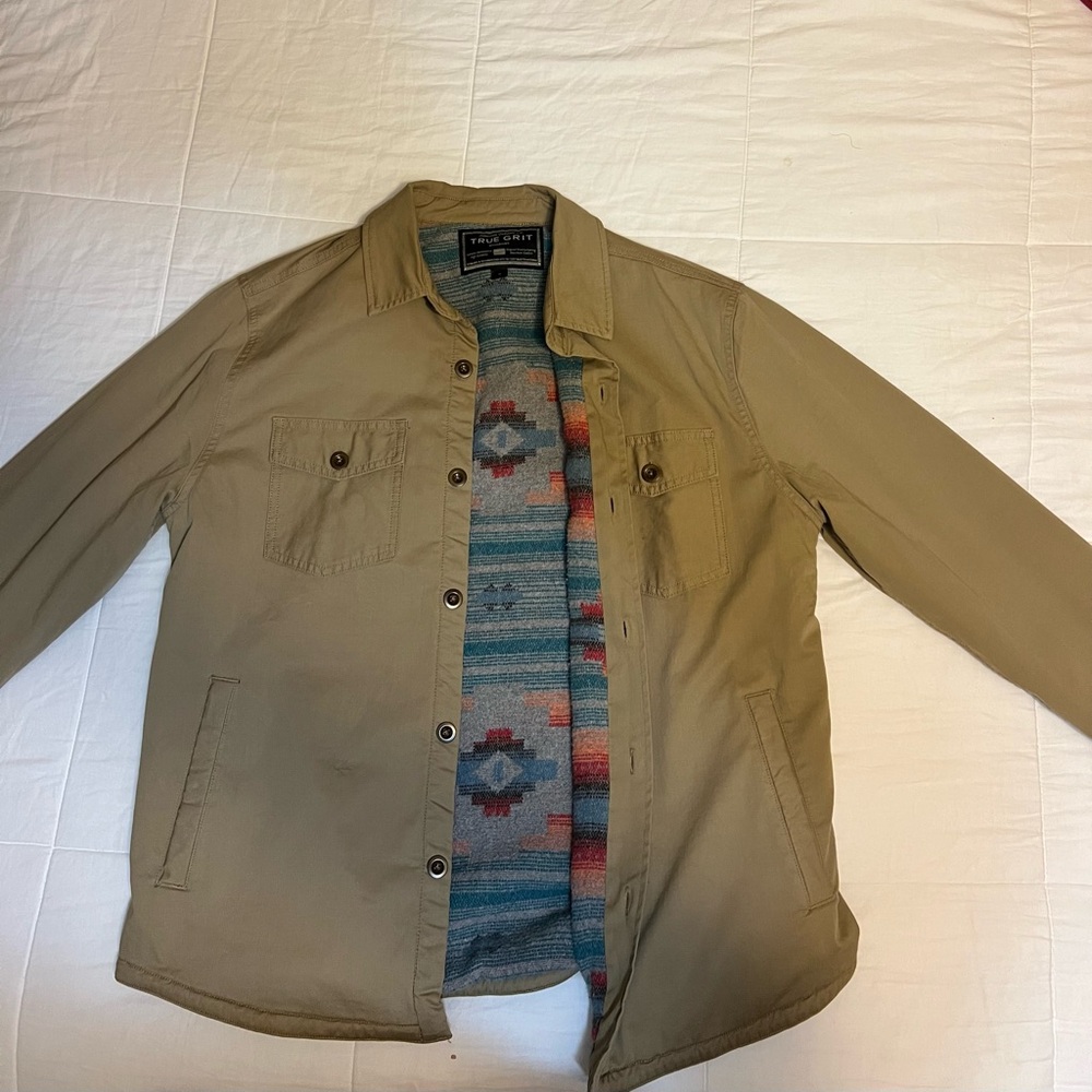True Grit Men's Khaki Jacket with Patterned Lining. In new condition, never warn